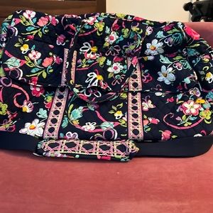Vera Bradley Traveler.